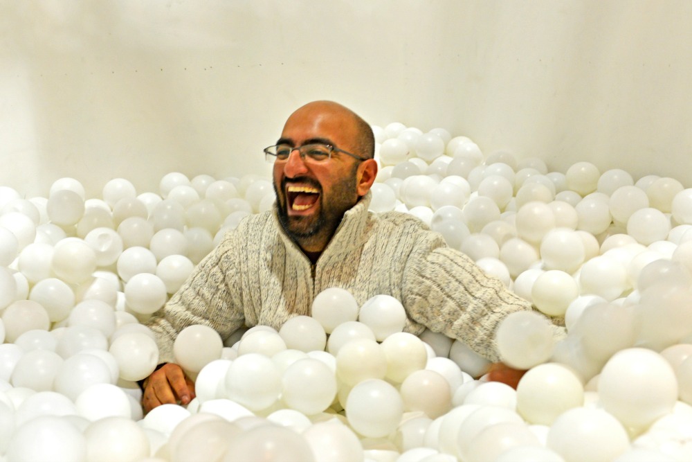 Co-founder Shamash Alidina playing in white ball pit